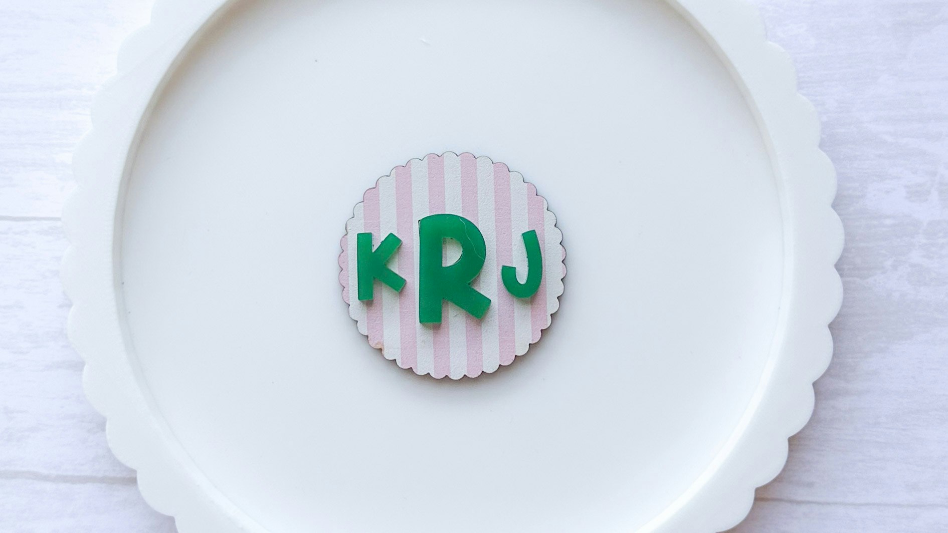 Monogram Scallop Badge Reel Key Chain